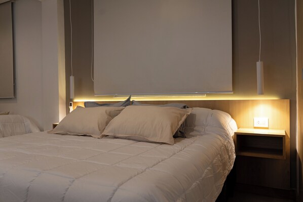 Deluxe Room | Minibar, in-room safe, desk, laptop workspace