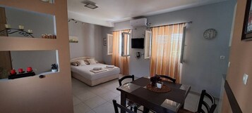 Classic Studio, Balcony, Garden View | Laptop workspace, free WiFi