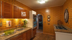 Villa | Private kitchen | Fridge, cookware/dishes/utensils