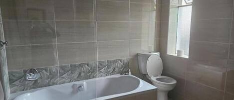 Hair dryer, towels, soap, toilet paper