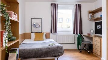 Blackout curtains, free WiFi, bed sheets