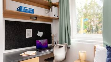Blackout curtains, free WiFi, bed sheets