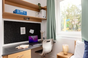 Blackout curtains, free WiFi, bed sheets