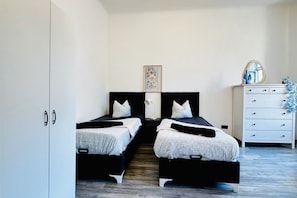 2 bedrooms, iron/ironing board, bed sheets