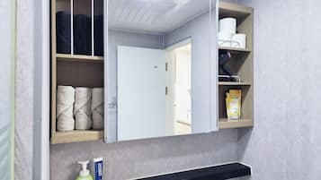 Hair dryer, towels, soap, shampoo