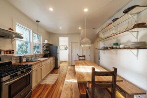 Fridge, oven, coffee/tea maker, cookware/dishes/utensils