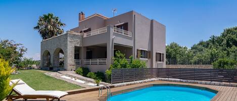 Outdoor pool, pool umbrellas, pool loungers