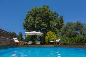 Outdoor pool, pool umbrellas, sun loungers