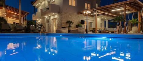 Outdoor pool, pool umbrellas, pool loungers