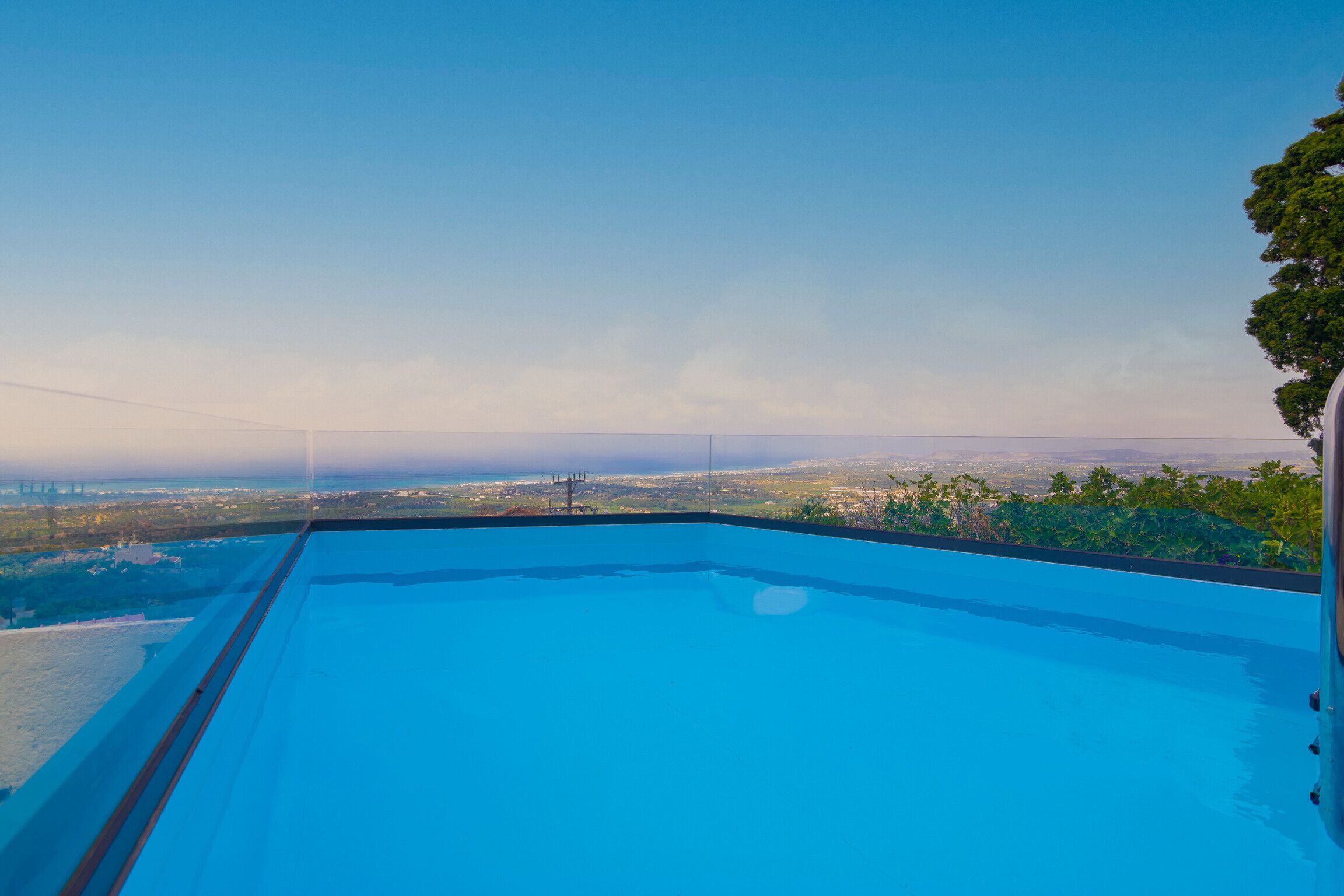A rooftop pool with a clear view of the cityscape.