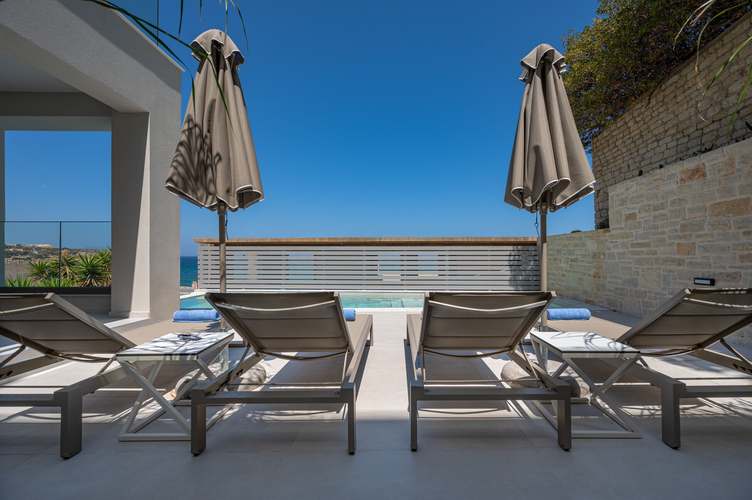 Outdoor pool, pool umbrellas, pool loungers