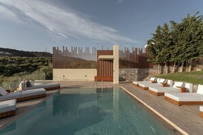 Outdoor pool, free cabanas, pool umbrellas