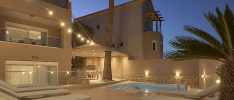 Outdoor pool, pool umbrellas, pool loungers