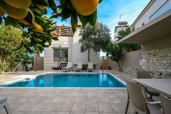 Outdoor pool, pool umbrellas, pool loungers