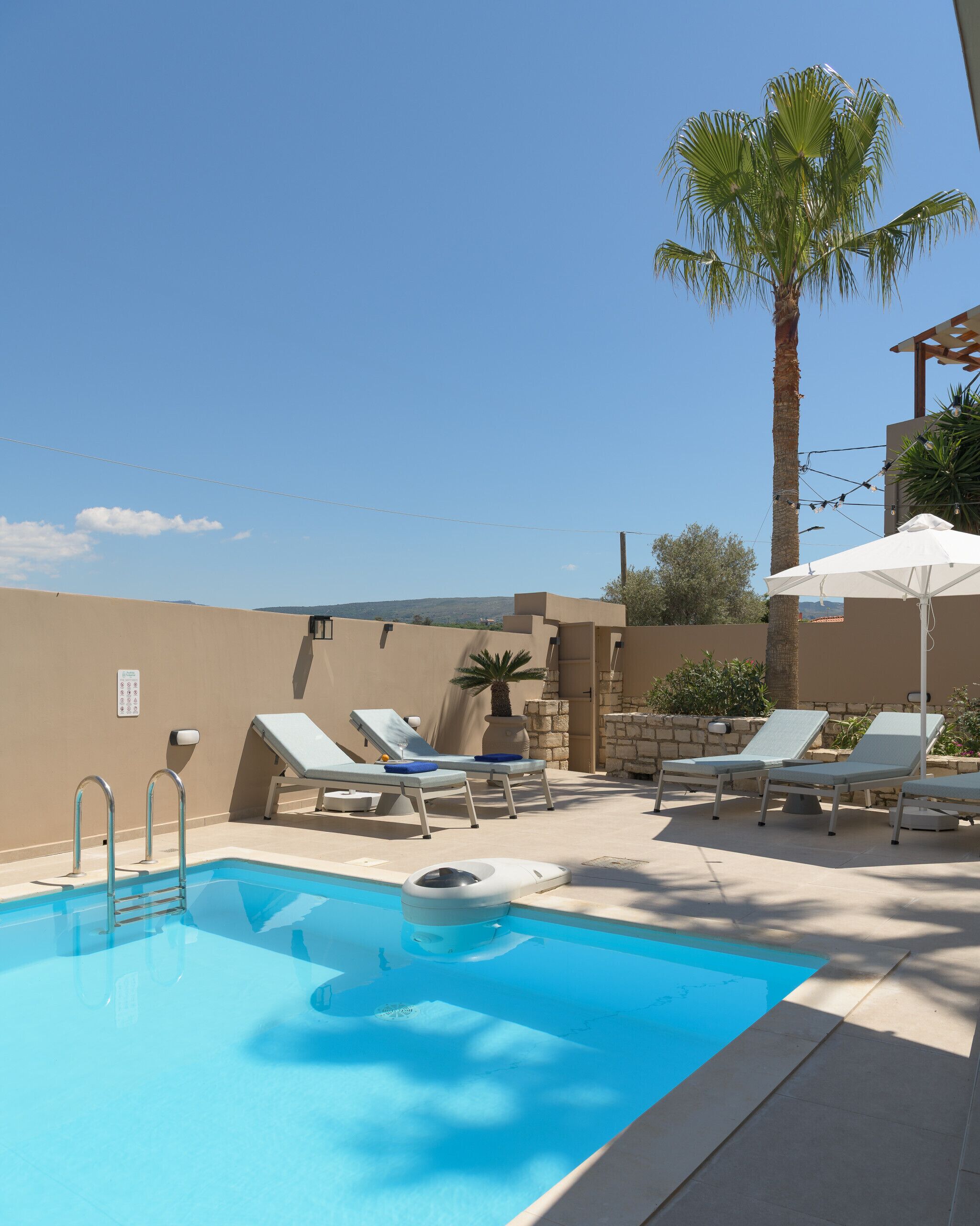 Outdoor pool, pool umbrellas, pool loungers