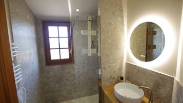 Shower, hair dryer, towels, toilet paper