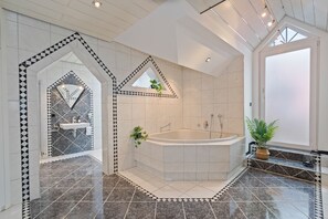 Jetted bath, hair dryer, towels, soap
