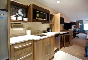 Fridge, microwave, coffee/tea maker, cookware/dishes/utensils