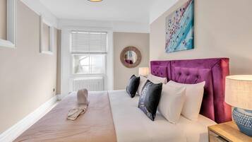 2 slaapkamers, een strijkplank/strijkijzer, gratis wifi, beddengoed