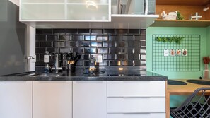 Fridge, microwave, stovetop, cookware/dishes/utensils