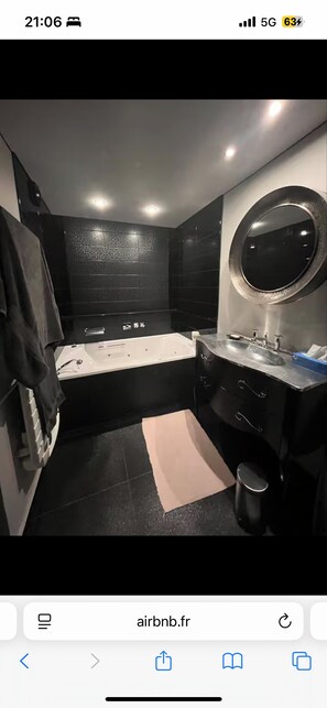 Jetted bath, hair dryer, towels, soap