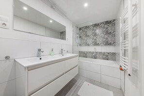 Hair dryer, towels, soap, shampoo