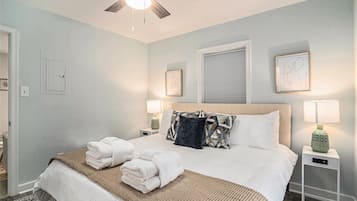 1 bedroom, desk, iron/ironing board, travel crib