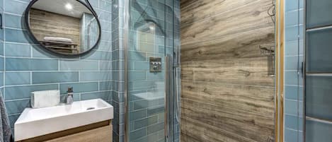Shower, towels, soap, toilet paper
