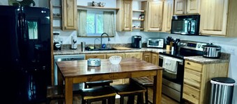 Enjoy the river from this freshly renovated home with a private boat ramp.