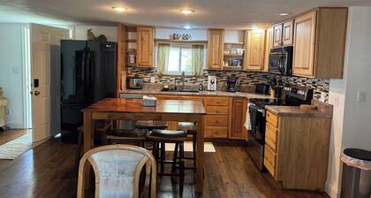 Enjoy the river from this freshly renovated home with a private boat ramp.