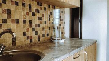 Fridge, stovetop, cookware/dishes/utensils