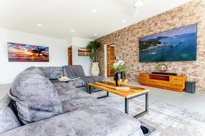 Smart TV, video games, DVD player, foosball