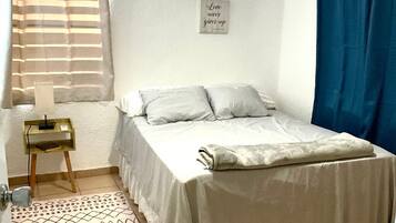 2 dormitorios, tabla de planchar con plancha, wifi y ropa de cama