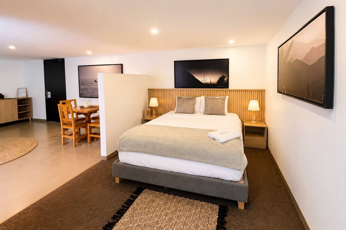 Deluxe Suite, Courtyard View | Premium bedding, down comforters, in-room safe, desk