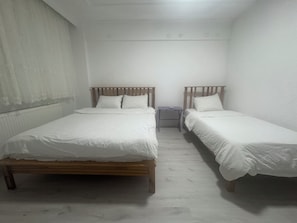 Room, Multiple Beds | Laptop workspace, free WiFi