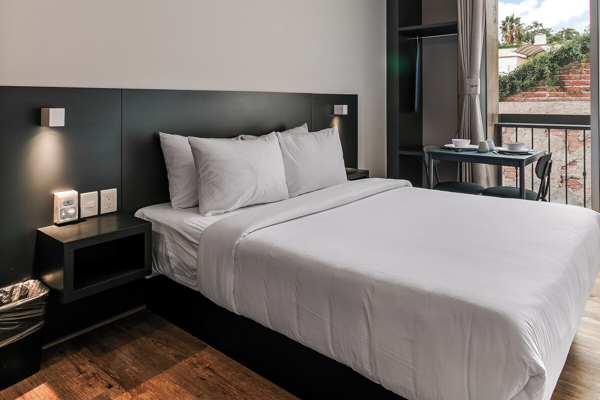 Comfort Apartment, 1 Queen Bed, Balcony, Courtyard View | Memory foam beds, desk, laptop workspace, iron/ironing board