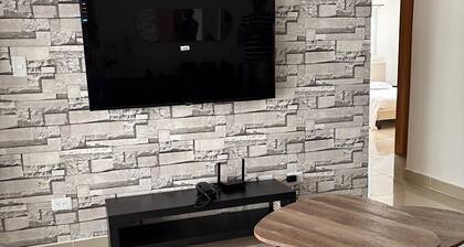 Charming 3-bedroom apartment with Wi-Fi, AC in welcoming Santo Domingo Este.