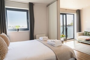 1 dormitorio, tabla de planchar con plancha, cuna de viaje y wifi