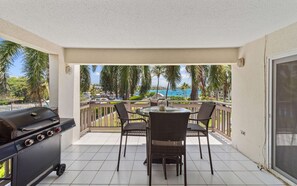 Outdoor dining - Beachfront 3br condo with pool & gym! (St. Thomas)