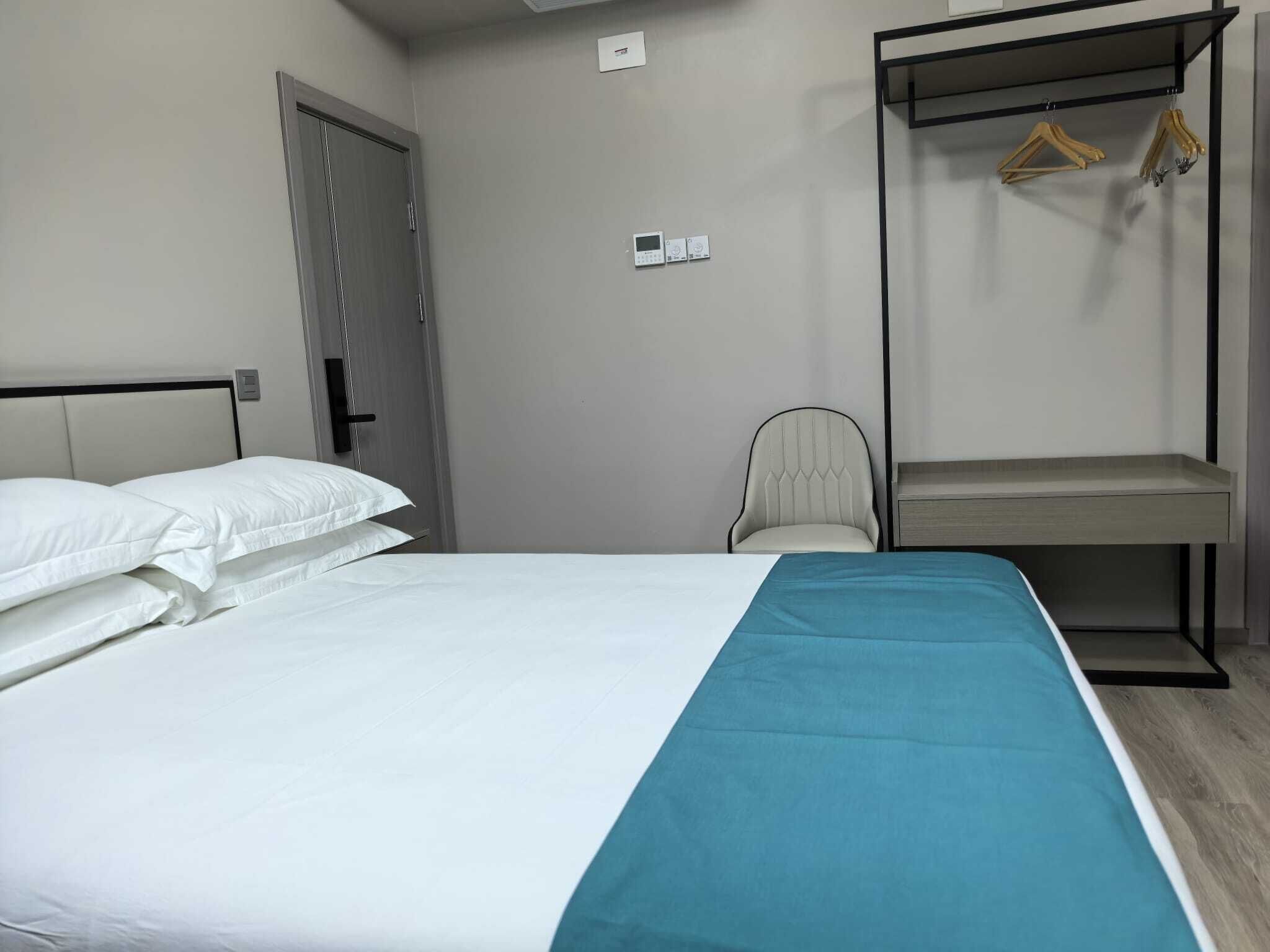 Suite Studio Deluxe | Coffres-forts dans les chambres, rideaux occultants