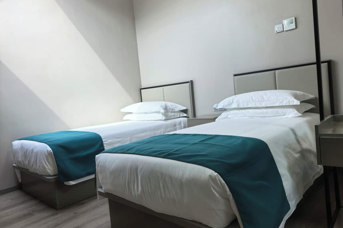 Chambre de base double pour 1 personne, 2 lits jumeaux | Coffre-fort, rideaux dâobscurcissement, systĂšme dâinsonorisation