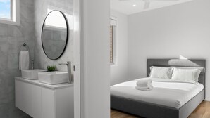 A modern bathroom with a large mirror, a sink, and a towel ring. The room has a clean, minimalist design with white walls and a tiled floor. - Cork & Vine on Coolalta  - A Cellar Door Escape (Nulkaba)