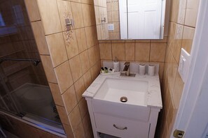 Hair dryer, towels, soap, toilet paper