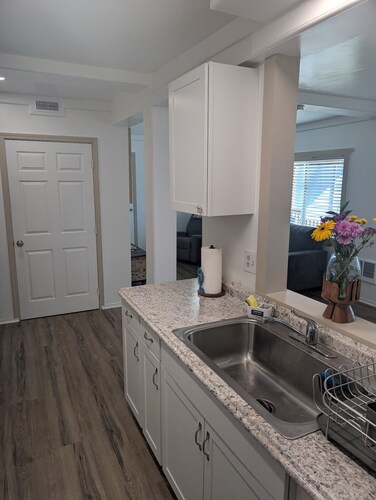 Lakeside Retreat with Big Porch, Extra Parking, and Prime Downtown Location