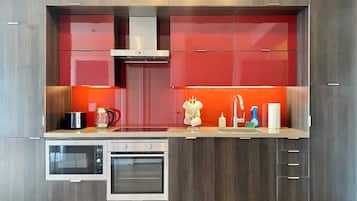 Luxury Apartment, City View | Private kitchen | Fridge, microwave