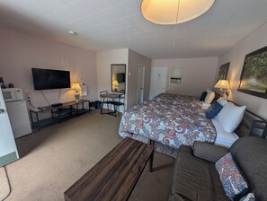 Deluxe vierpersoonskamer, 2 queensize bedden | Een bureau, een strijkplank/strijkijzer, gratis wifi