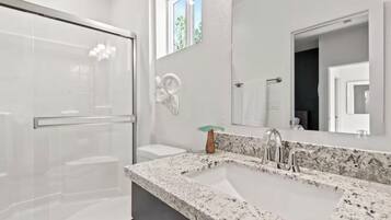 Hair dryer, towels, soap, toilet paper