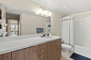 Hair dryer, towels, soap, shampoo