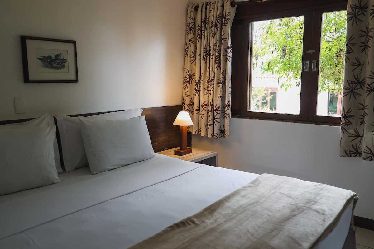 Deluxe Suite, Garden View | In-room safe, soundproofing, free WiFi, wheelchair access