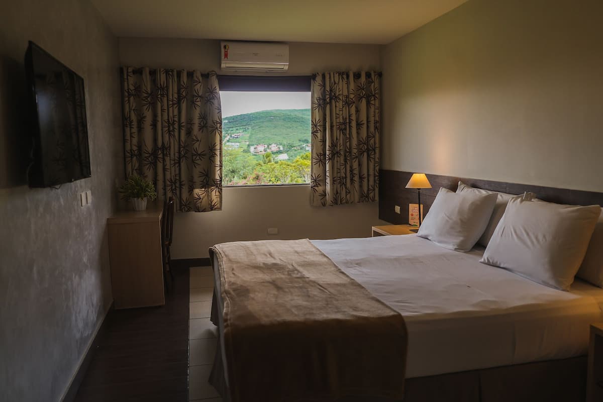 Deluxe Room, Garden View | In-room safe, soundproofing, free WiFi, wheelchair access